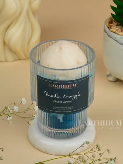 Wrap yourself in the warm, sweet scent of my Vanilla Snuggle candle. It's comfort in a jar.