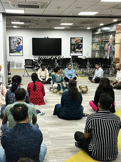 This image captures a moment of connection and learning during a corporate workshop. One of my certified students is leading the session, demonstrating the growing community and reach of our sound healing practices.