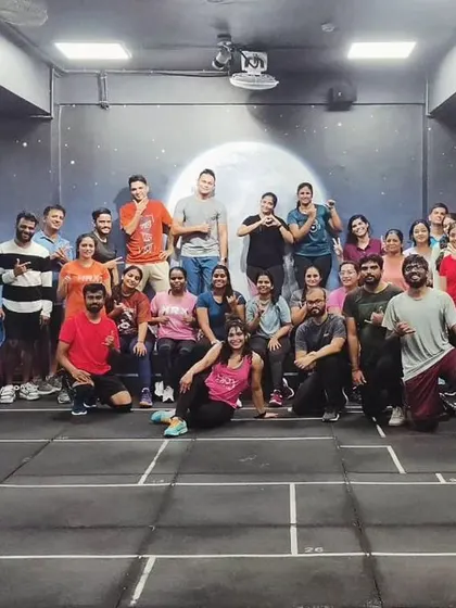 The heart and soul of my classes. Each photo captures a unique moment with my incredible community after a sweaty, joyful session. This is our shared victory lap.
