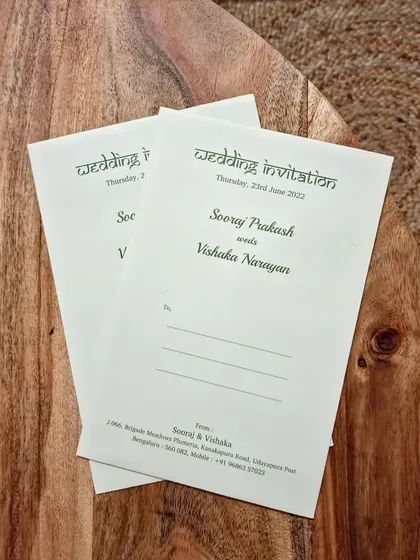 The beauty of a minimalist design is in its simplicity and elegance. This image shows the custom-designed wedding invitation envelope, featuring clean typography on high-quality paper, perfectly complementing the illustrated card inside.