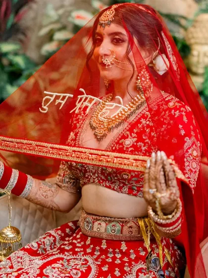 "Tum prem ho." A beautiful, artistic shot of Divya under her veil. The focus is on the emotion of the moment, enhanced by her timeless bridal makeup.