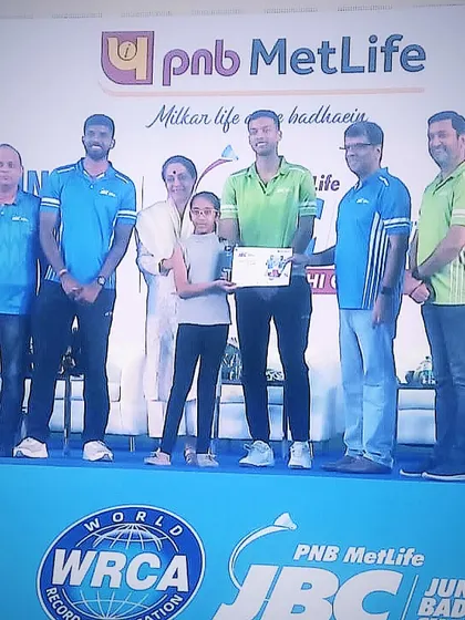 We celebrate every victory. Here, our student Akshita receives her award at the PNB Metlife Junior Badminton Championship. Our program is designed to guide players to success on prestigious national platforms.