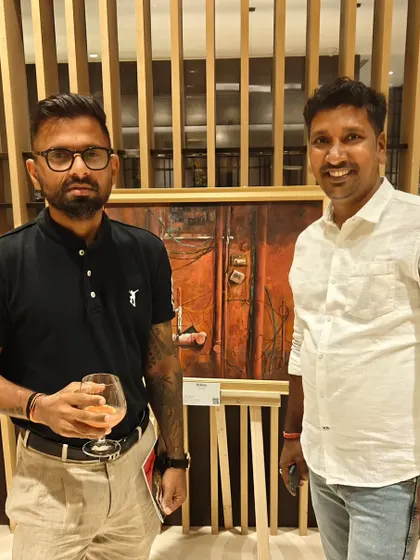Artists and guests mingling at the 'Ethereal Charm' exhibition at Conrad Bengaluru.