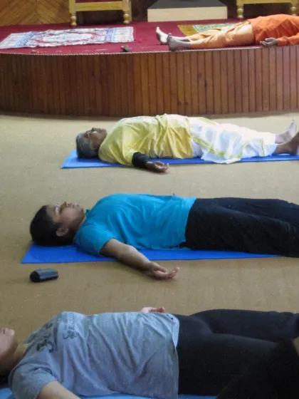 Students in Savasana after an intense asana session. Learning to guide and experience profound relaxation is a critical skill for any yoga teacher.