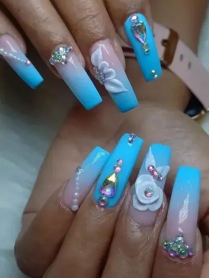 A duplicate view of our extravagant 3D nail art, showcasing the beautiful blue ombré and rhinestone work.