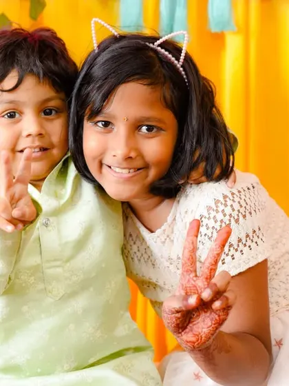 Brother and sister, best friends for life. A cute and fun portrait of two siblings during a celebration.
