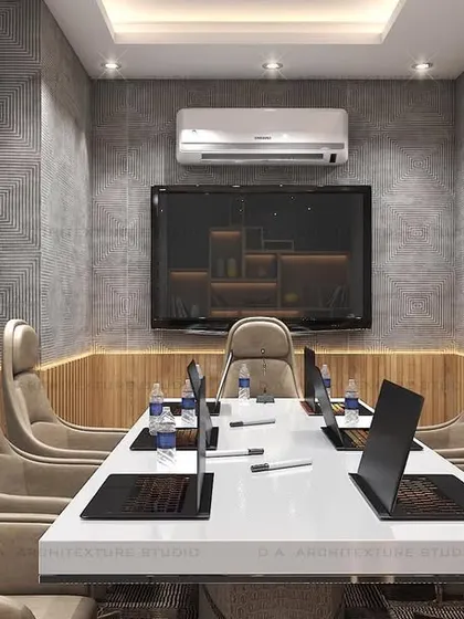 A 3D render for a conference room in NSP, featuring modern, comfortable chairs and a textured concrete wall.