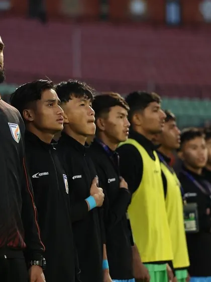 Standing with the Indian U17 team during the national anthem in Bhutan. This is a moment of immense pride, representing our country on an international stage.