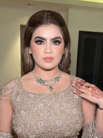 This 21-year-old makeup enthusiast wanted full glam for her event. I created a look with glowing skin and dramatic eyes that was youthful yet sophisticated.