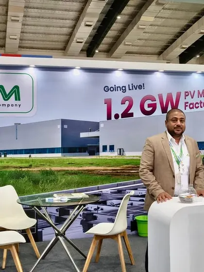 My regional manager for South India and a colleague at our professionally designed booth. We present our 1.2 GW PV Module Factory and our latest products to industry professionals.