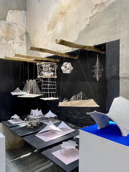 An exhibition of student models exploring tensile and lightweight structures. This kind of material exploration is vital for innovation in architecture.