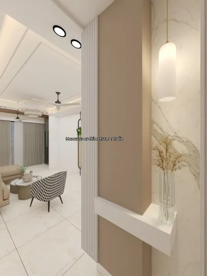 A close-up of an entryway partition I designed, featuring fluted panels and a small niche for decor. This element helps define the living area while maintaining an open and airy feel.