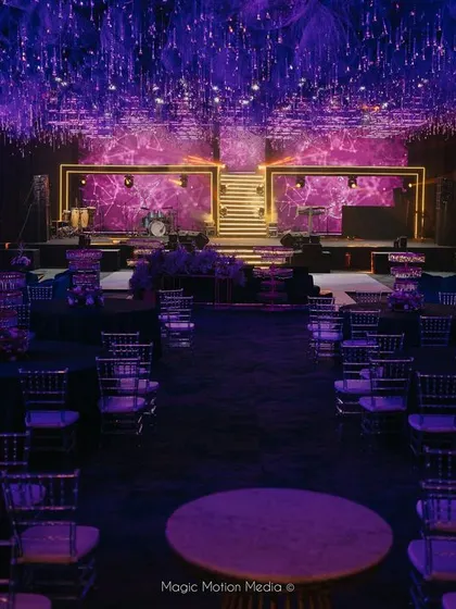 A full view of our celestial-themed Sangeet setup, featuring a ceiling dripping with thousands of crystals and a stage designed for an epic night of performances.