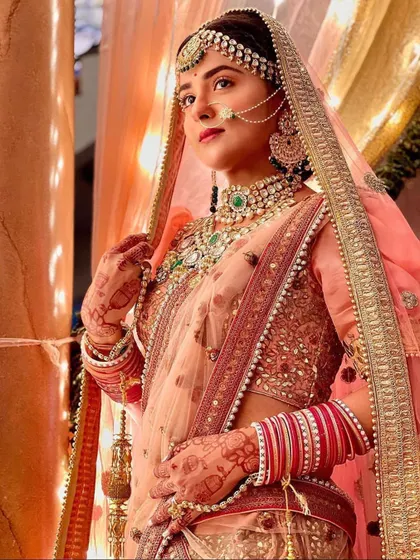 Another gorgeous shot of Debattama Saha in her bridal look for the TV show, with the henna I applied looking beautiful with her outfit.