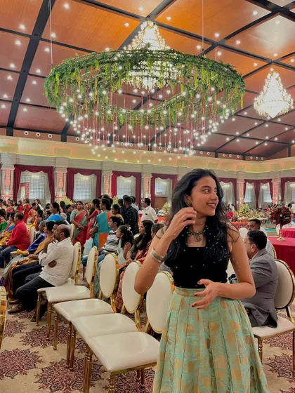 A duplicate of image 53, enjoying the grand decorations and festive feel at a wedding event.