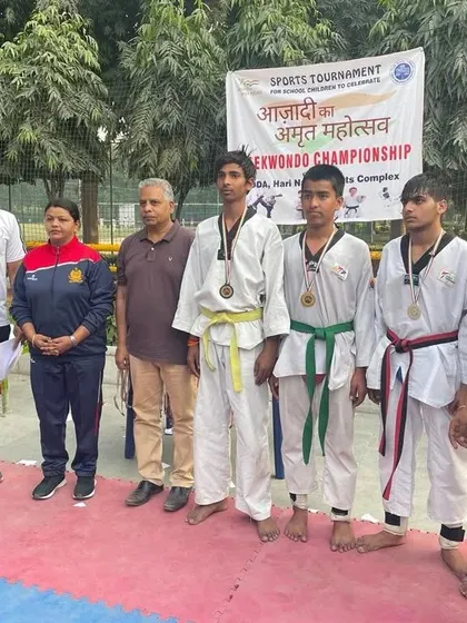 Our medalists on the podium at the DDA Hari Nagar Sports Complex Taekwondo Championship.