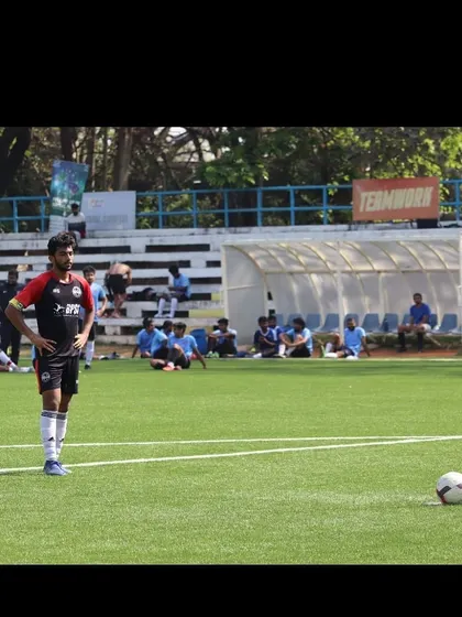 Ashwin on the field, ready to take a free-kick. His journey is an inspiration.