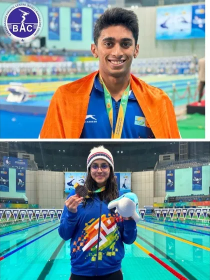 Aneesh and Sanjana with their silver medals from the BIMSTEC championship.
