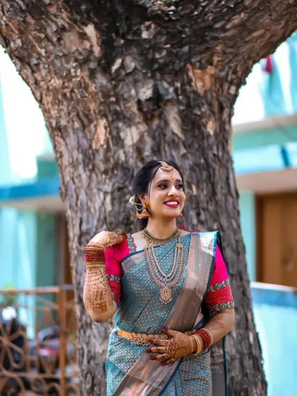 Another shot of our lovely bride, showcasing the beautiful smile and the confidence that a perfect outfit can bring on your special day.