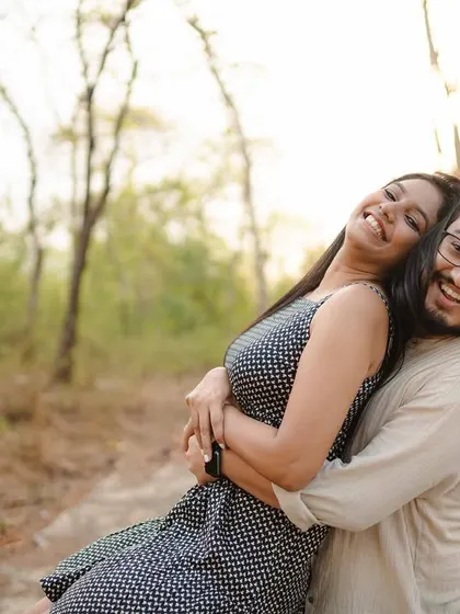 A playful, happy moment as Soham lifts Anjum in a hug. This photo is full of energy and affection, perfectly capturing the fun-loving nature of their relationship.