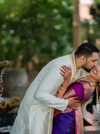 A romantic stroll in the rain. We embrace every element of the wedding day, even a little monsoon magic, to create unique and memorable couple portraits.