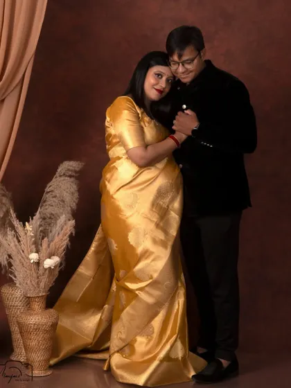 A beautiful portrait of the couple, their hands clasped, symbolizing their partnership on this journey.