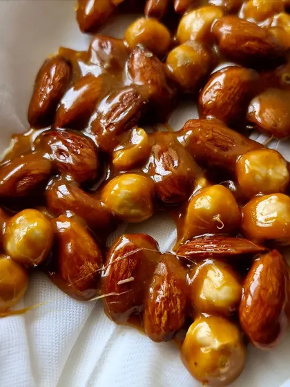 A close-up of our homemade Nut Praline, perfect for adding a crunchy layer to your cakes.