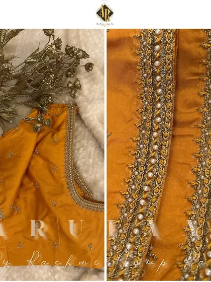 A mustard yellow blouse with a simple but elegant neckline embroidered with pearls and zardosi. This is a versatile piece that can be dressed up or down.