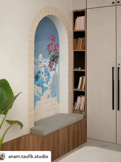 The completed Santorini mural integrated into the master bedroom, complete with a cozy reading nook. The artwork serves as both a beautiful view and a functional part of the room's design.