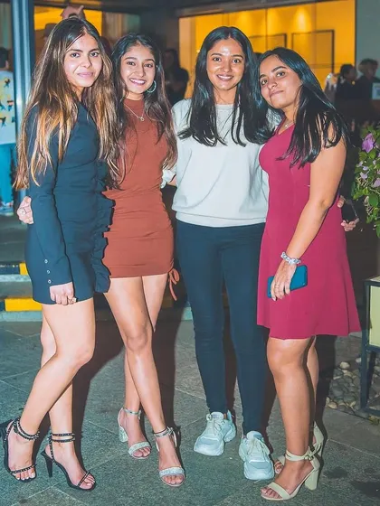 A group of friends posing for a photo.