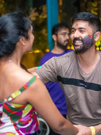A happy, color-smeared moment between two dancers. Combining the festival of colors with Latin dance was a huge success.