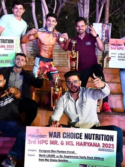 The Men's Physique overall champion at NPC Mr. Haryana. We celebrate our wins as a team.