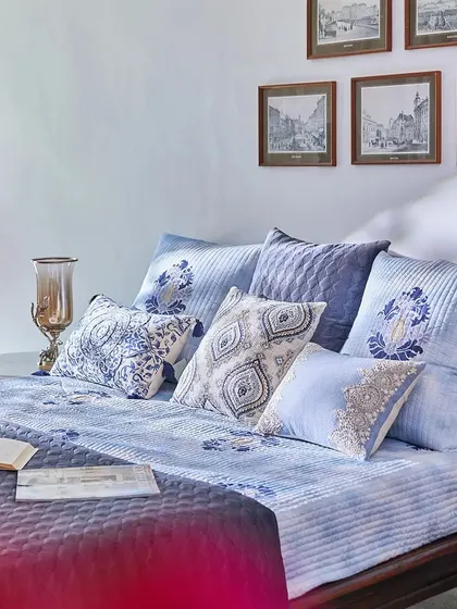 Let your home become a gallery of Indigo dreams. This bedroom, styled with my Indigo collection, shows how the various shades and patterns of blue can create a cohesive and serene atmosphere.