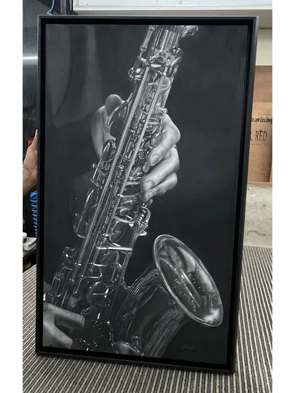 The framed version of my saxophone drawing, showing how the 21 by 36 inch piece looks as a finished, ready-to-hang artwork.