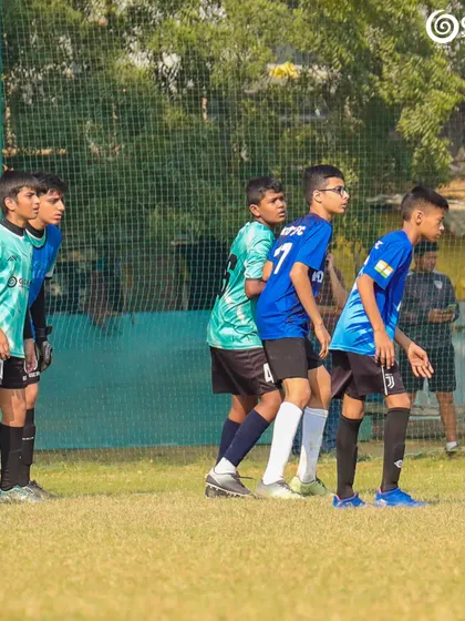 Players setting up a defensive wall, a key tactical element of the game.