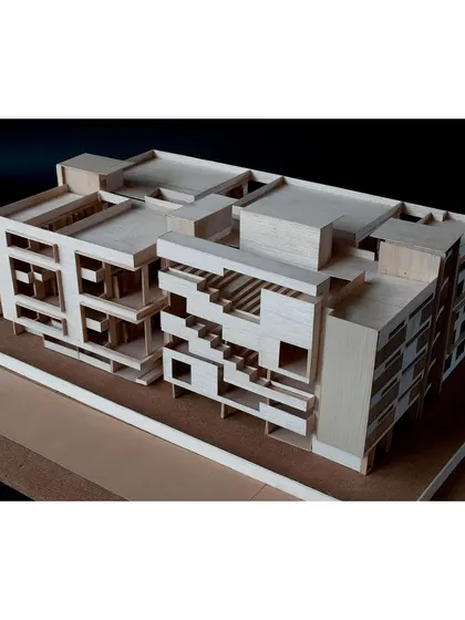 A balsa wood model of the "School of Courts." This technique is excellent for studying massing and the relationship between solid and void in the early stages of design.