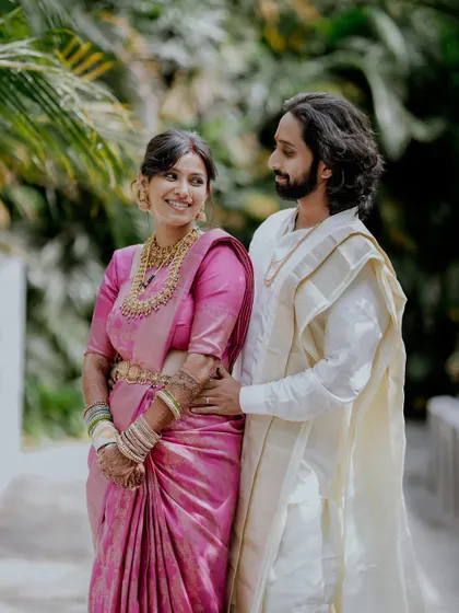 A beautiful post-ceremony portrait of the couple, the bride looking lovingly at her new husband.