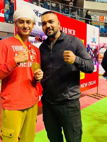 A young Sikh student with his gold medal. We welcome kids from all backgrounds.