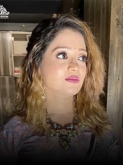A close-up of a soft party makeup look. The focus is on the gentle shimmer on the eyes and a pretty pink lip, perfect for a guest at a wedding.