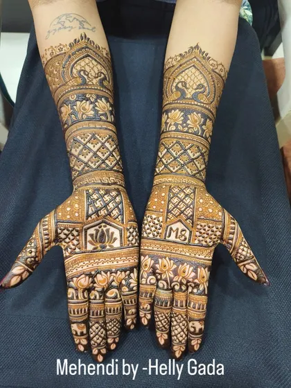 Sometimes, the beauty is in the patterns. This is a full-coverage bridal design focusing on intricate non-figurative work, with classic lotus motifs, Swastika symbols, and detailed jaal patterns.