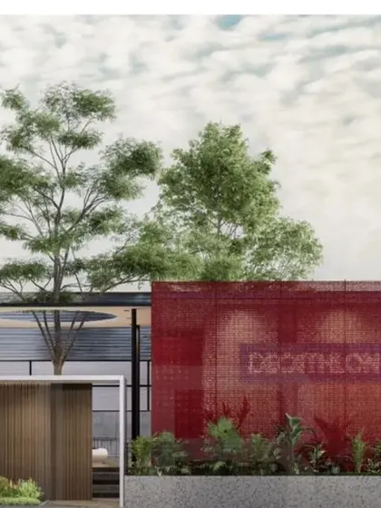 This is a duplicate of ID 20. Render of the Business Hub in Tiruppur, wrapped in a distinctive red metal shell.