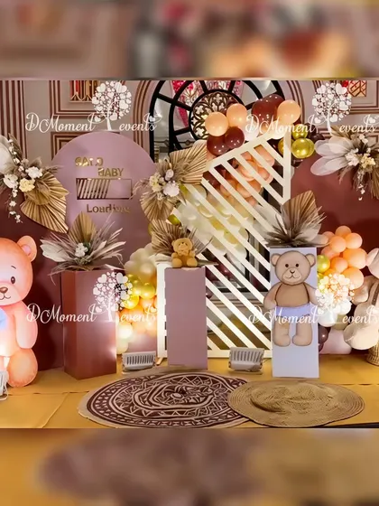 Another view of the modern teddy bear stage, highlighting the geometric backdrops and the artful arrangement of props and florals.