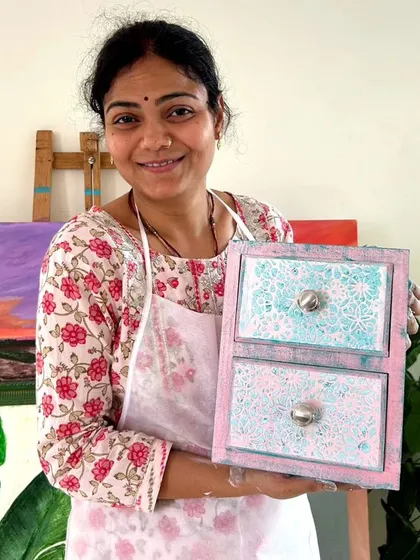 This artist created a lovely two-drawer chest with a crackled, distressed finish.