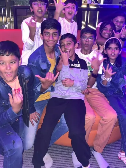 A group of kids rocking out at The Grid.