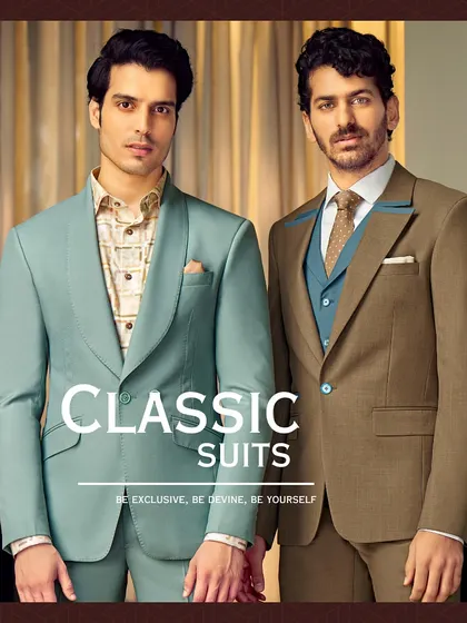 A classic suit epitomizes timeless elegance. This image showcases a light teal suit and a brown three-piece suit, both tailored to perfection to exude confidence.