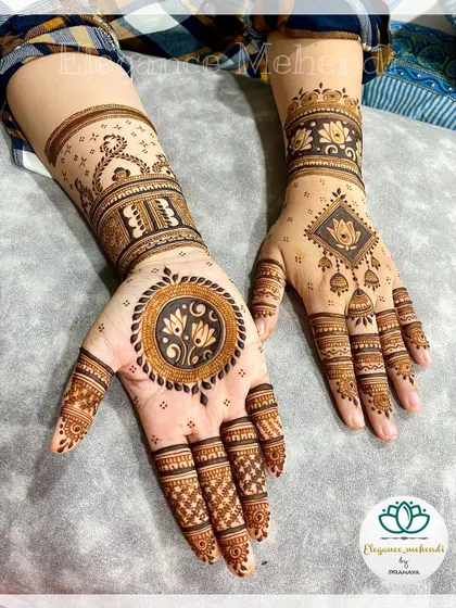 A minimal yet elegant design for a bride-to-be, featuring a lotus mandala and simple finger patterns.
