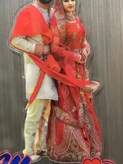 A beautiful wedding photo turned into a custom-shaped acrylic fridge magnet.
