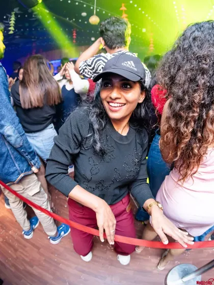 A cool, casual vibe from a guest at the party. It's all about enjoying the night in your own way.