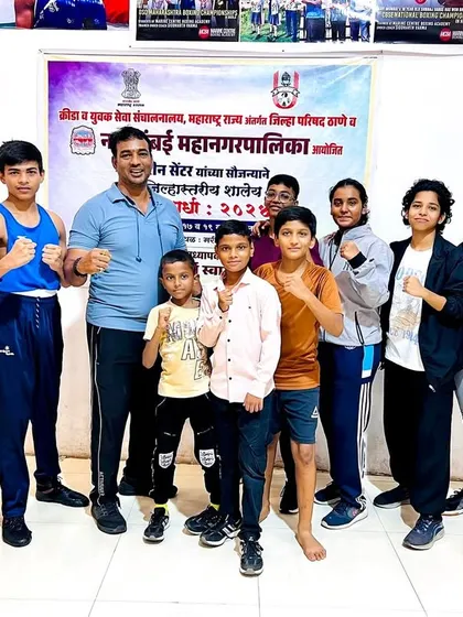 Our young boxers with their coach after the DSO tournament, tired but proud.