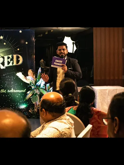 Engaging with the audience during a retirement party. My interactive style ensures that guests are participants, not just spectators.